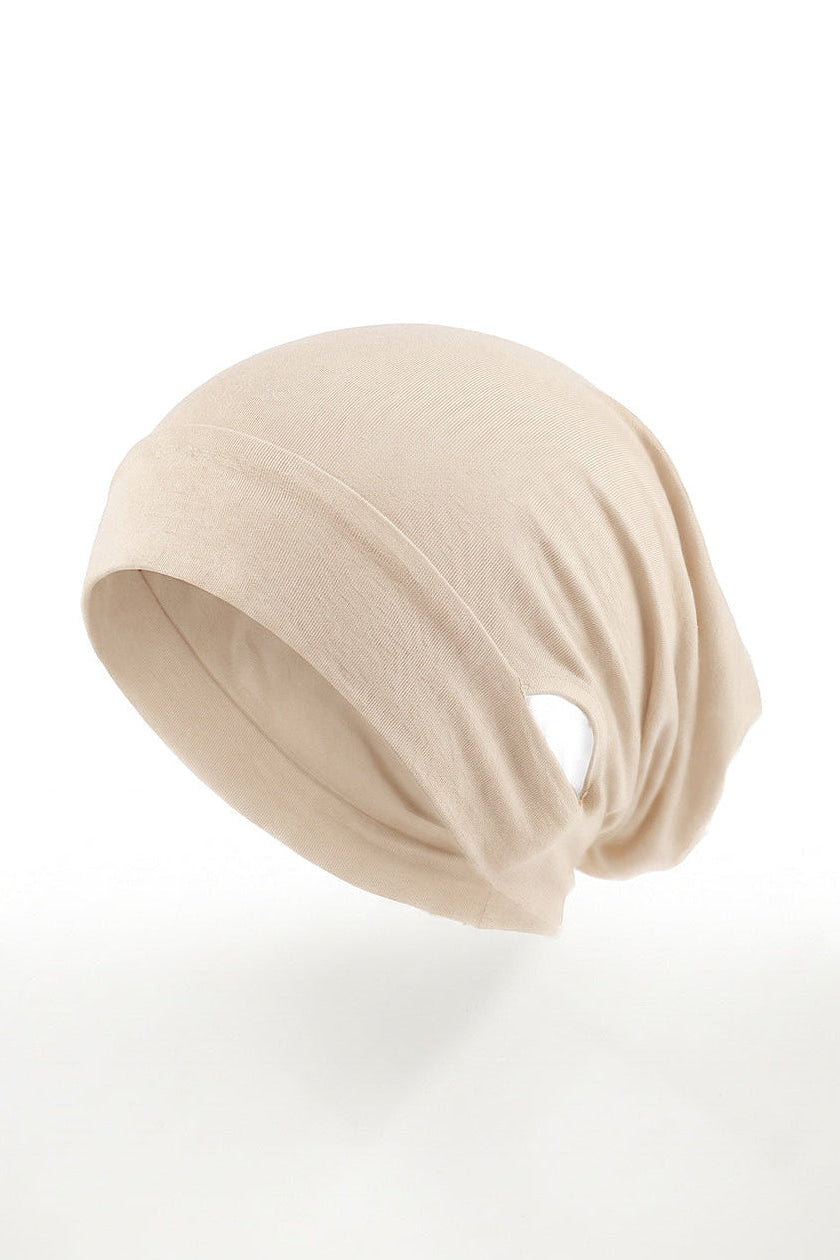 Cream ear free tube hijab under cap, second view