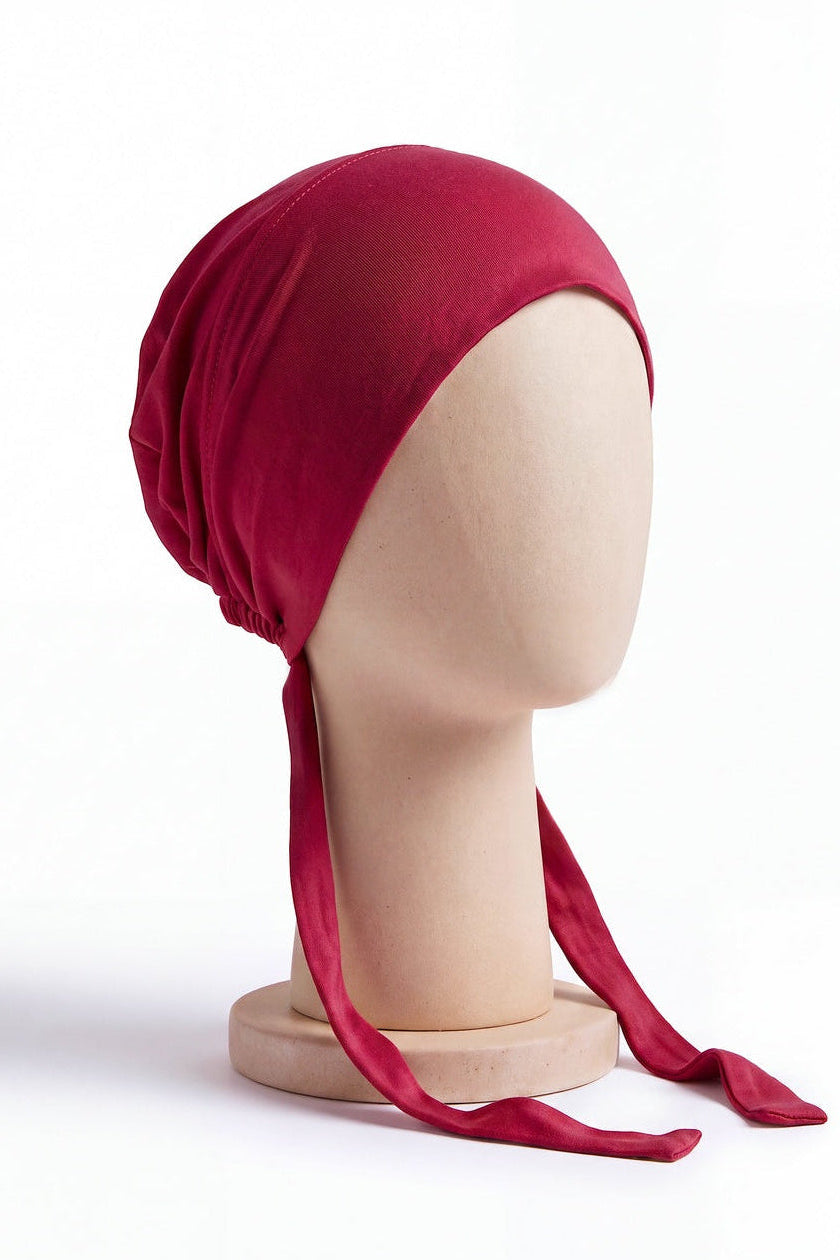 Mulberry tie back hijab under cap, second view