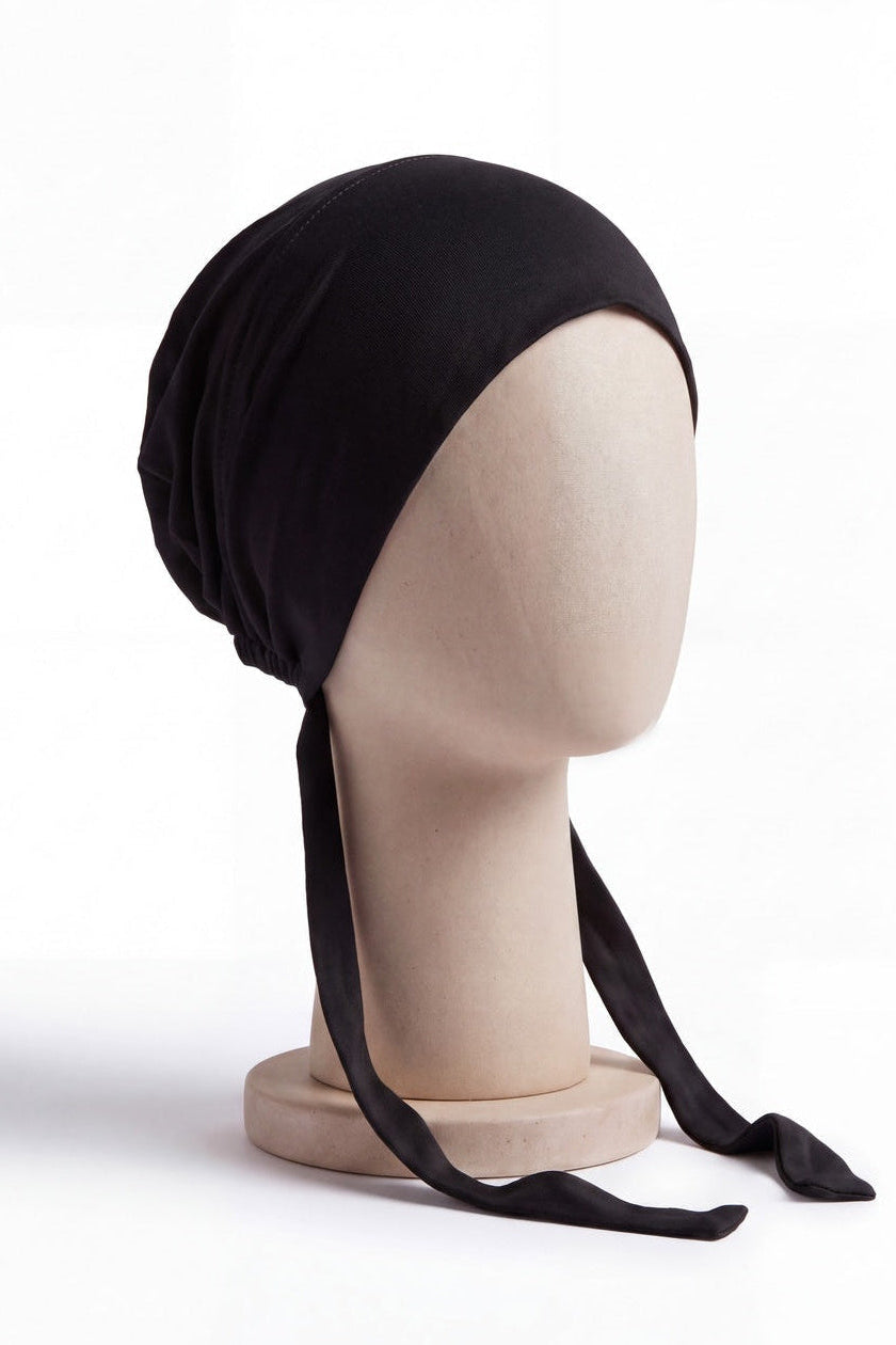 Black tie back hijab under cap, second view