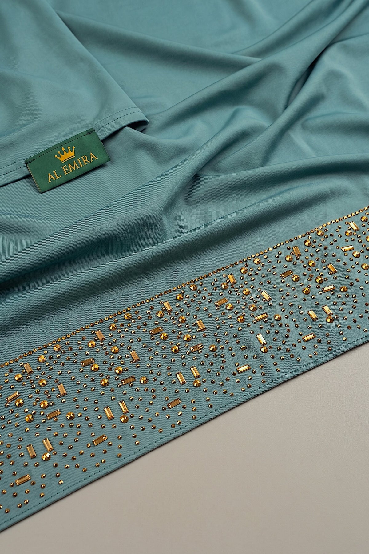 Deep blue-green liquid jersey hijab from the Al Emira Cascade range