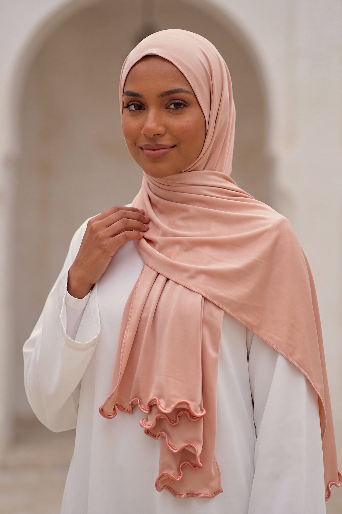 Al Emira Peach Satin Ripple hijab in a jersey, polyester and nylon blend
