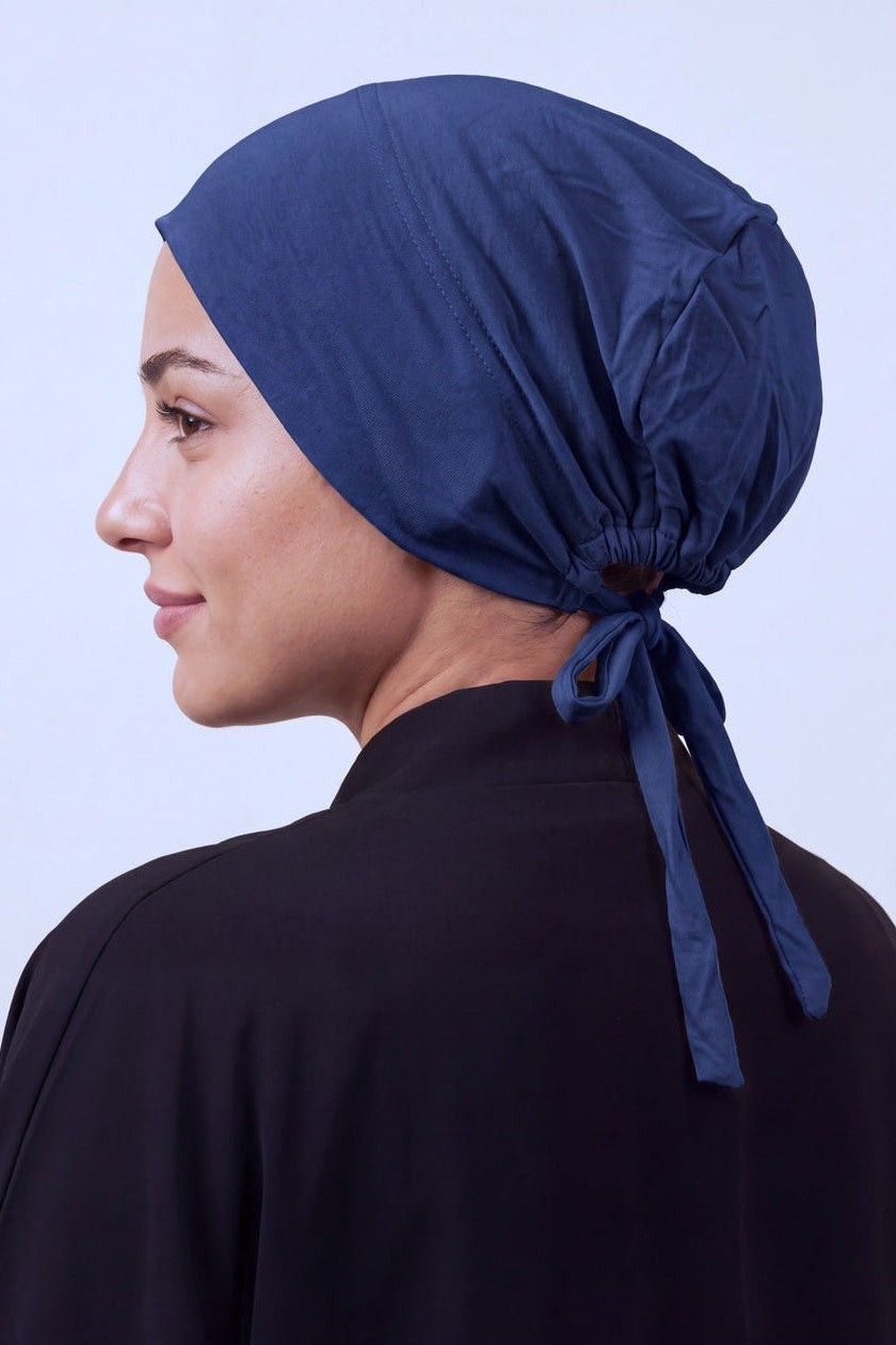 Navy tie back hijab under cap