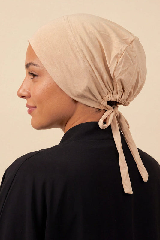Sand tie back hijab under cap