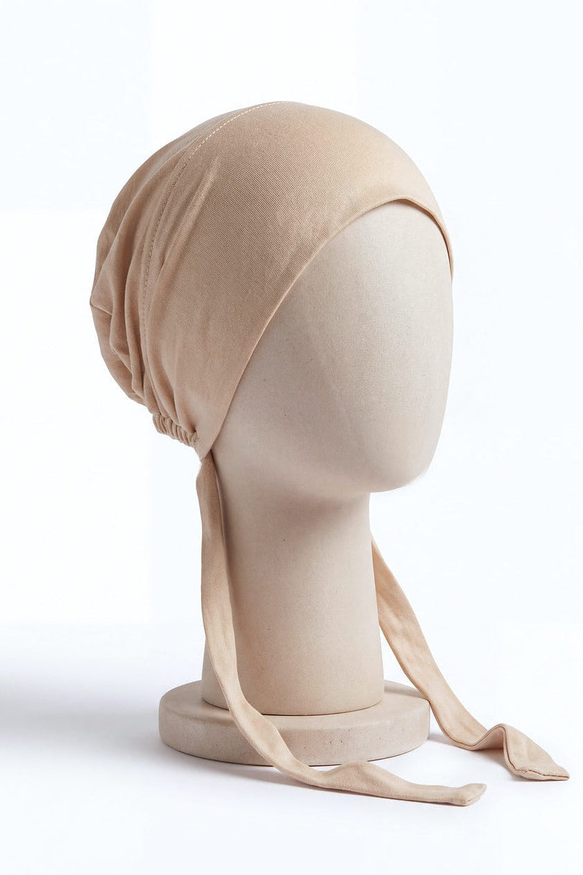 Sand tie back hijab under cap, second view