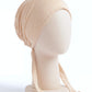 Cream tie back hijab under cap, second view