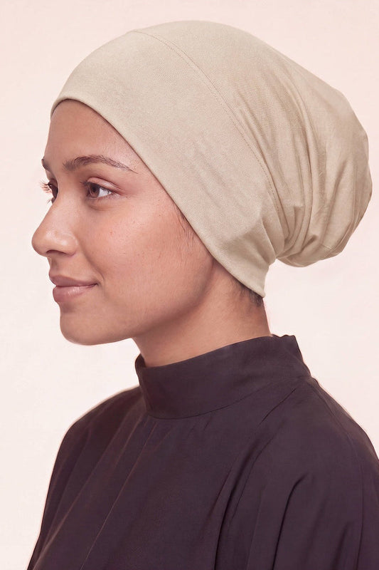 Stone tube hijab under cap