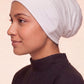 White tube hijab under cap