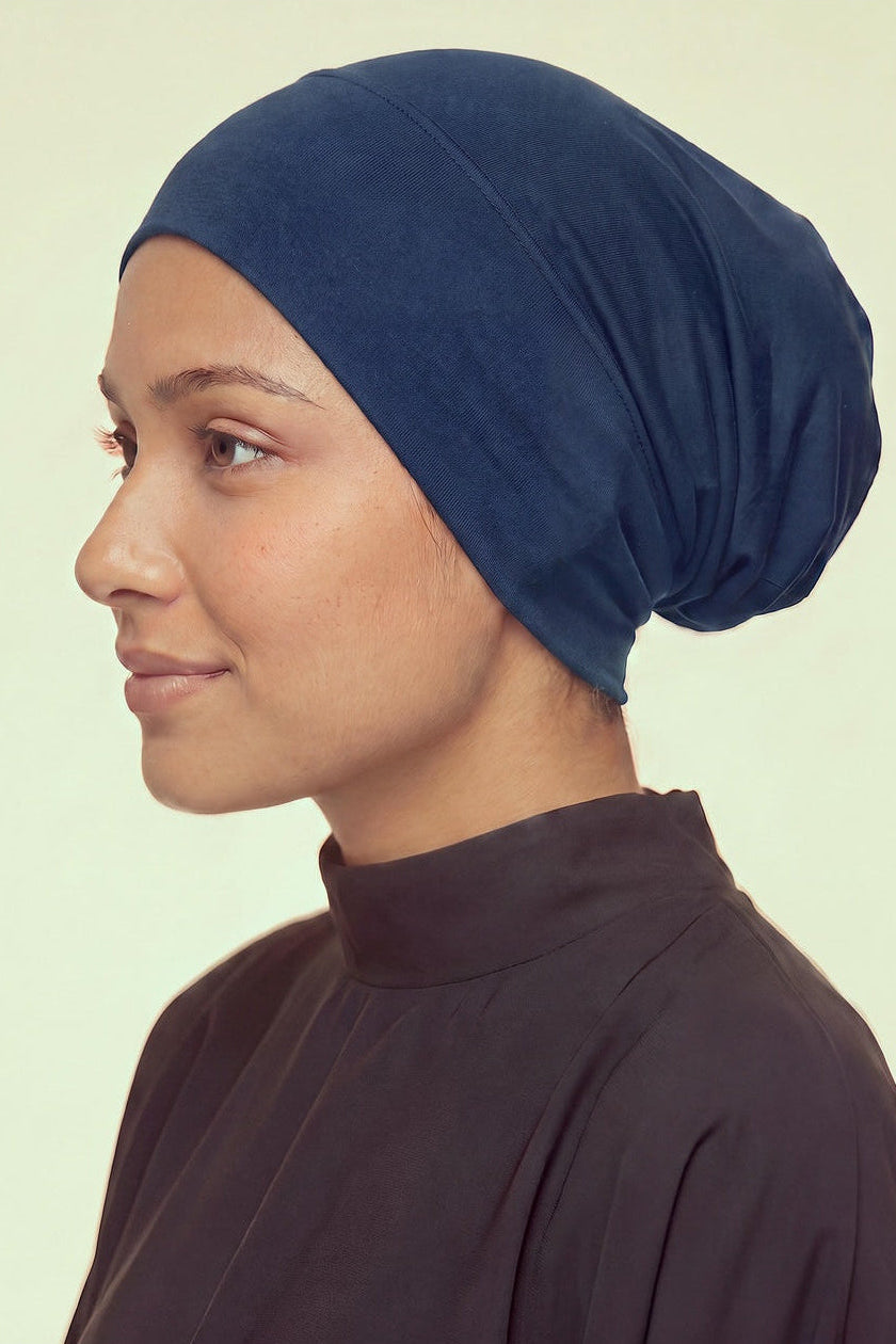 Navy tube hijab under cap